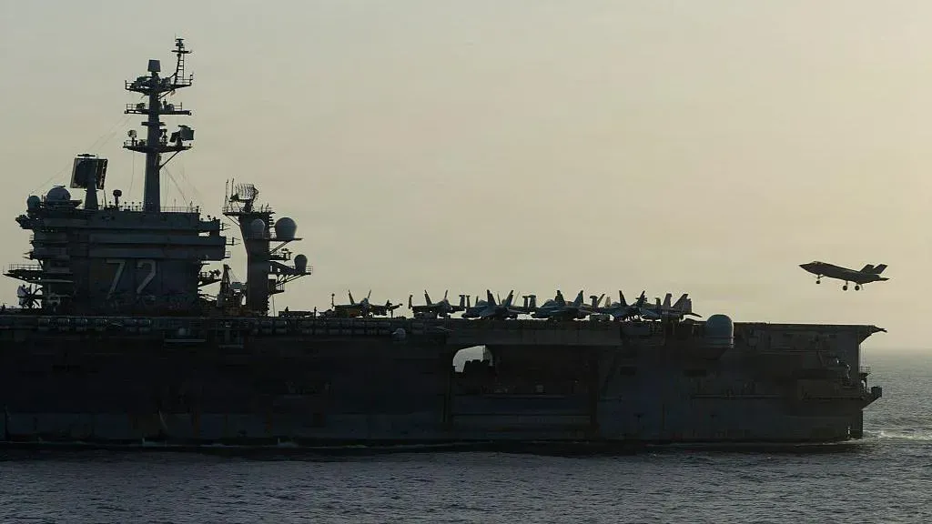 Concern grows over conditions aboard US aircraft carrier deployed in Middle East
