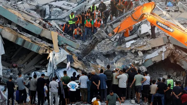 At least 12 killed as war-damaged building collapses in Gaza City