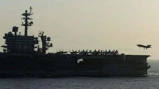 Concern grows over conditions aboard US aircraft carrier deployed in Middle East